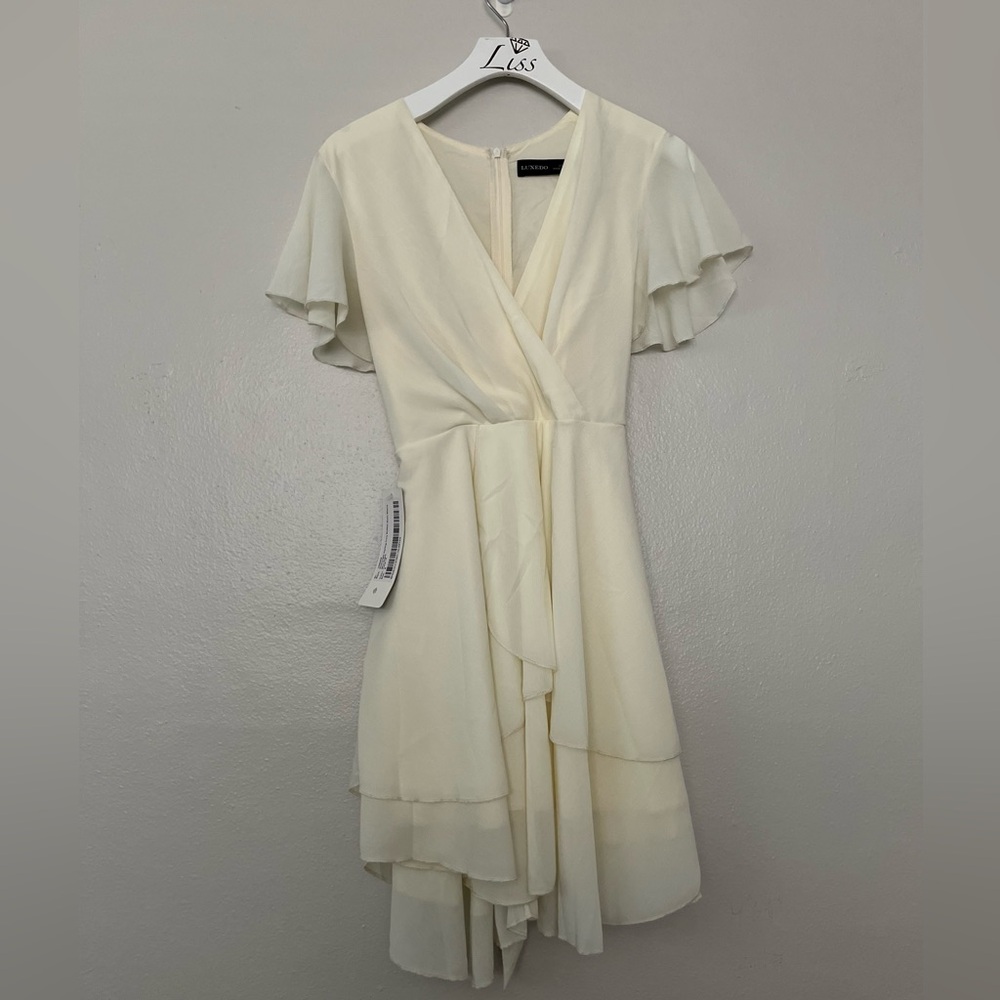 Downright Darling Ivory Ruffled Short Sleeve Dress